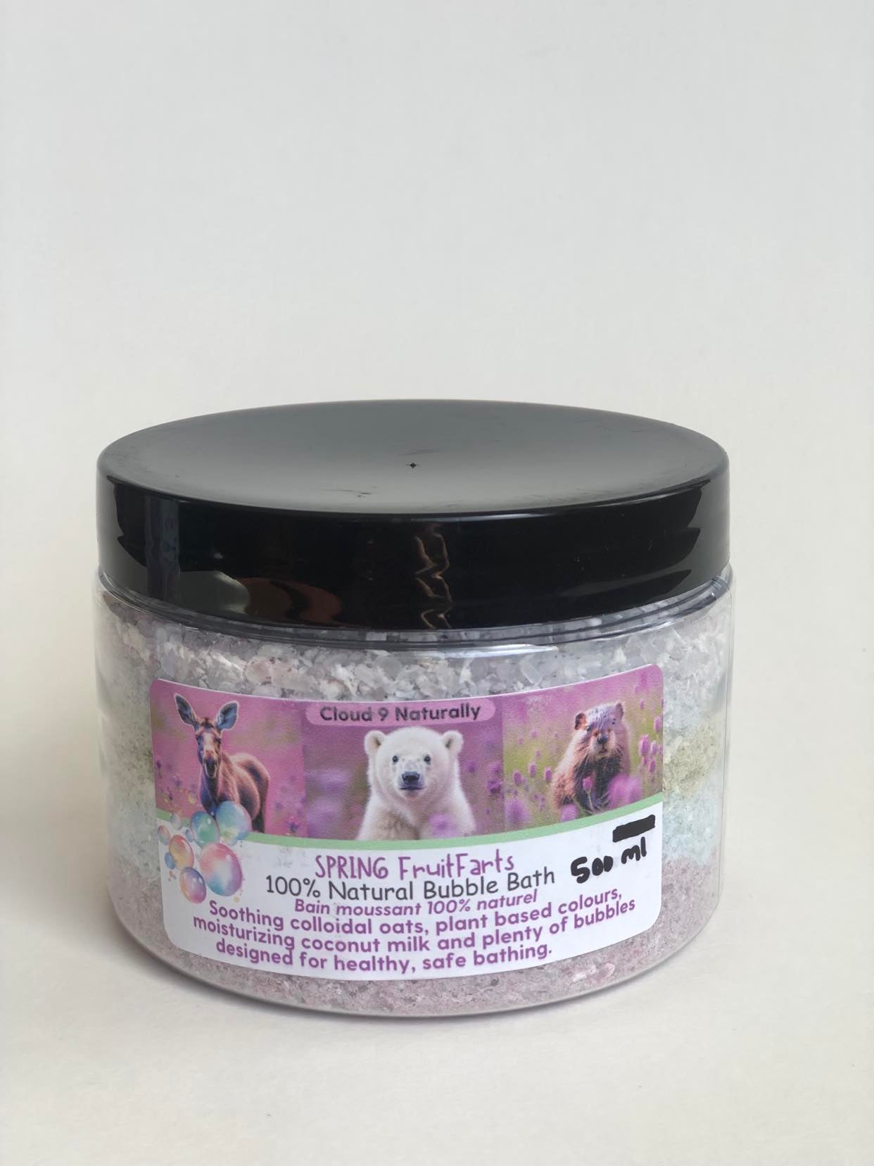 Spring bubble bath salts 500ml pastic clear tub with label. Black plasti lid.