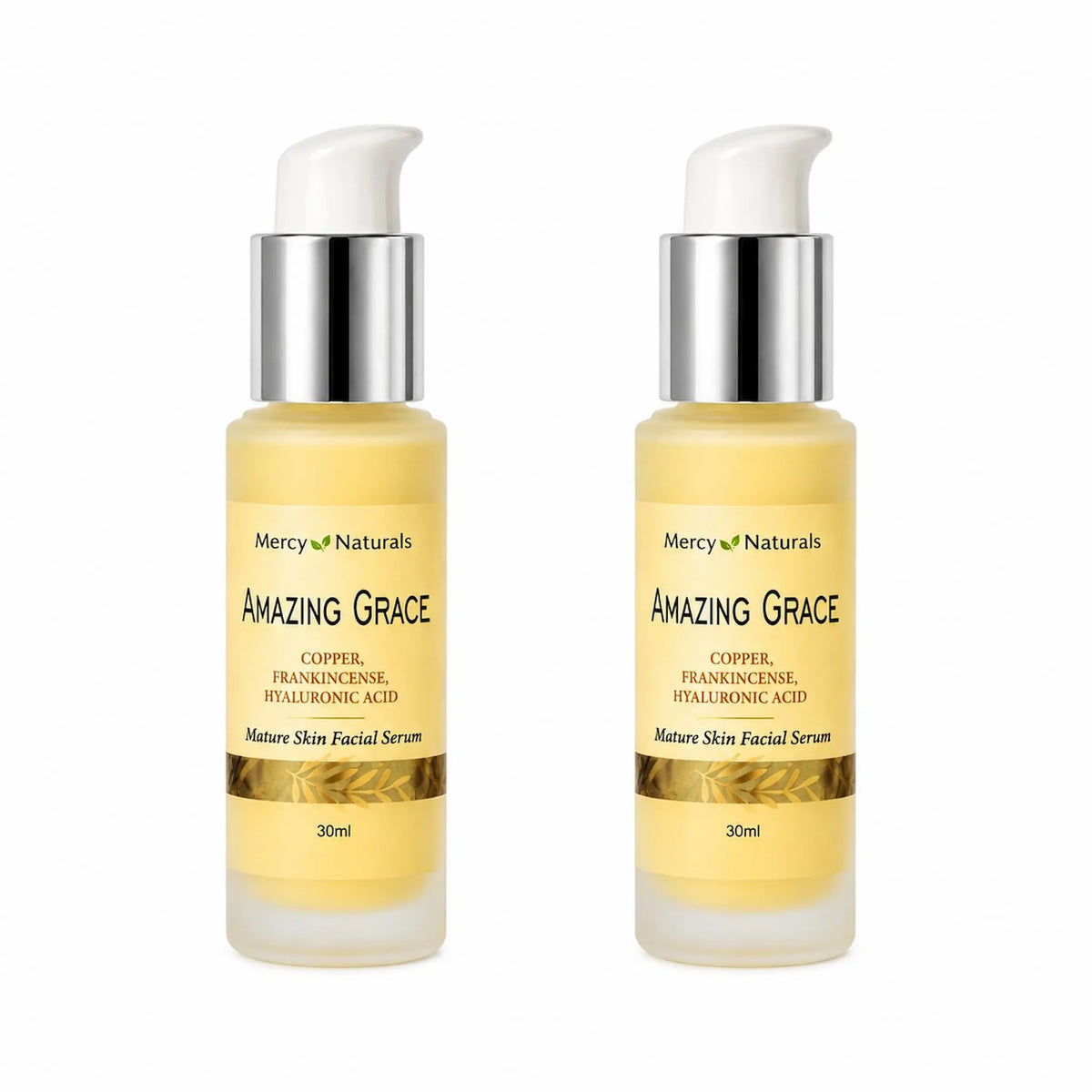 Two bottles of Mercy Naturals Amazing Grace serum on a white background