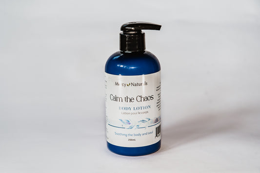 Body lotion bottle labeled 'Calm the Chaos' on a white background