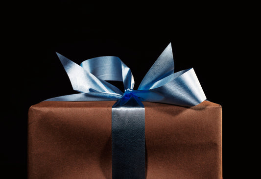 Gift card with a picture of a box with a blue bow.