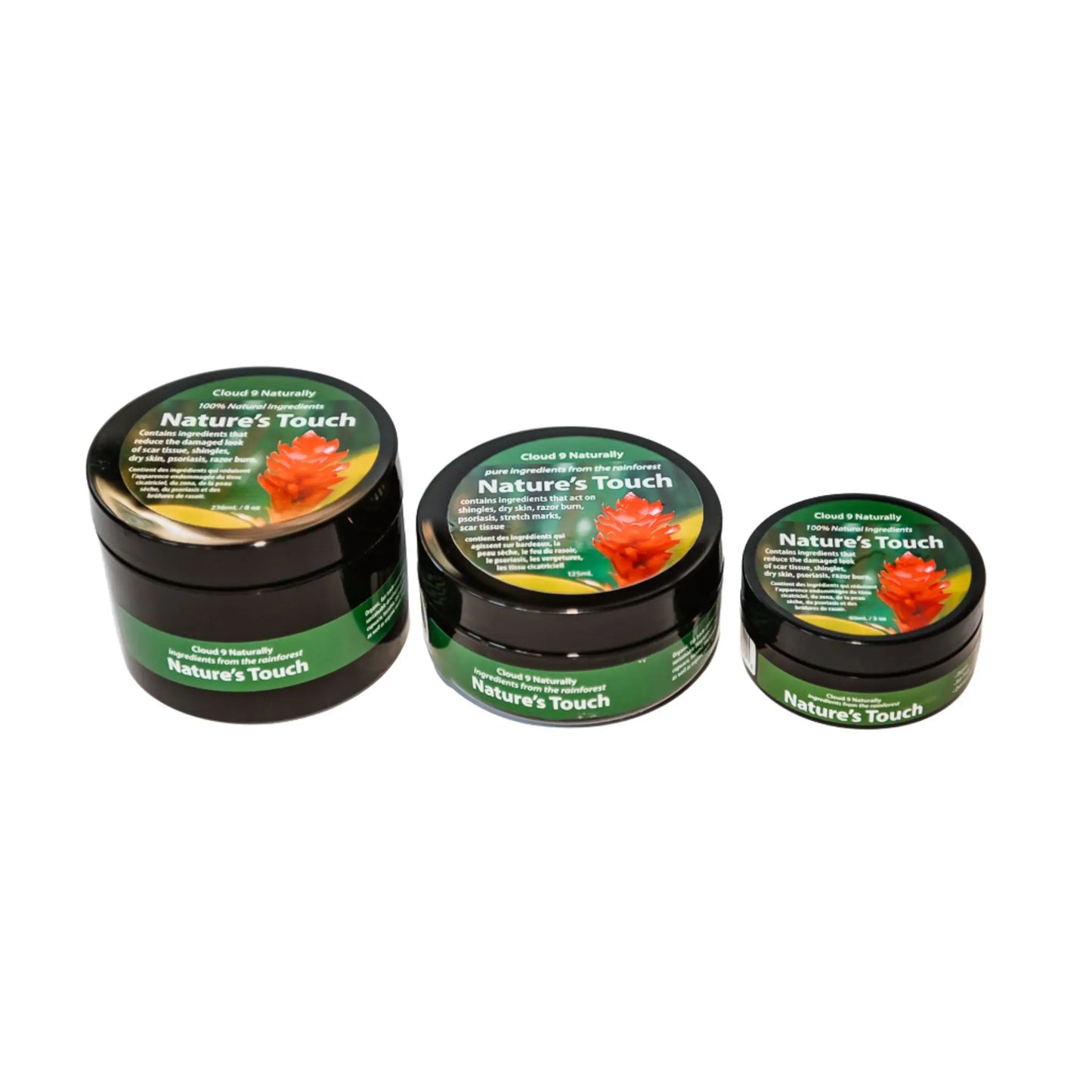 Three jars of 'Nature's Touch' cream on a white background