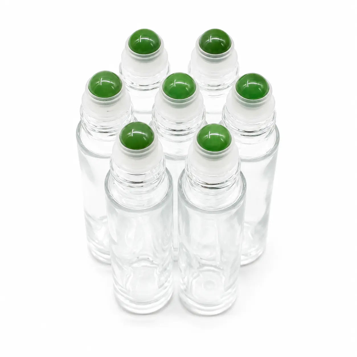 Six clear glass rollerball bottles with green adventurine gemstone, arranged in a cluster on a white background.