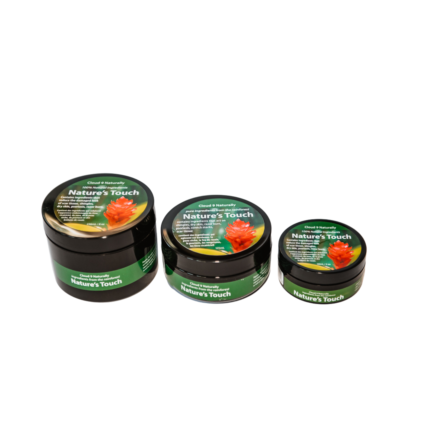 Three jars of 'Nature's Touch' cream on a white background