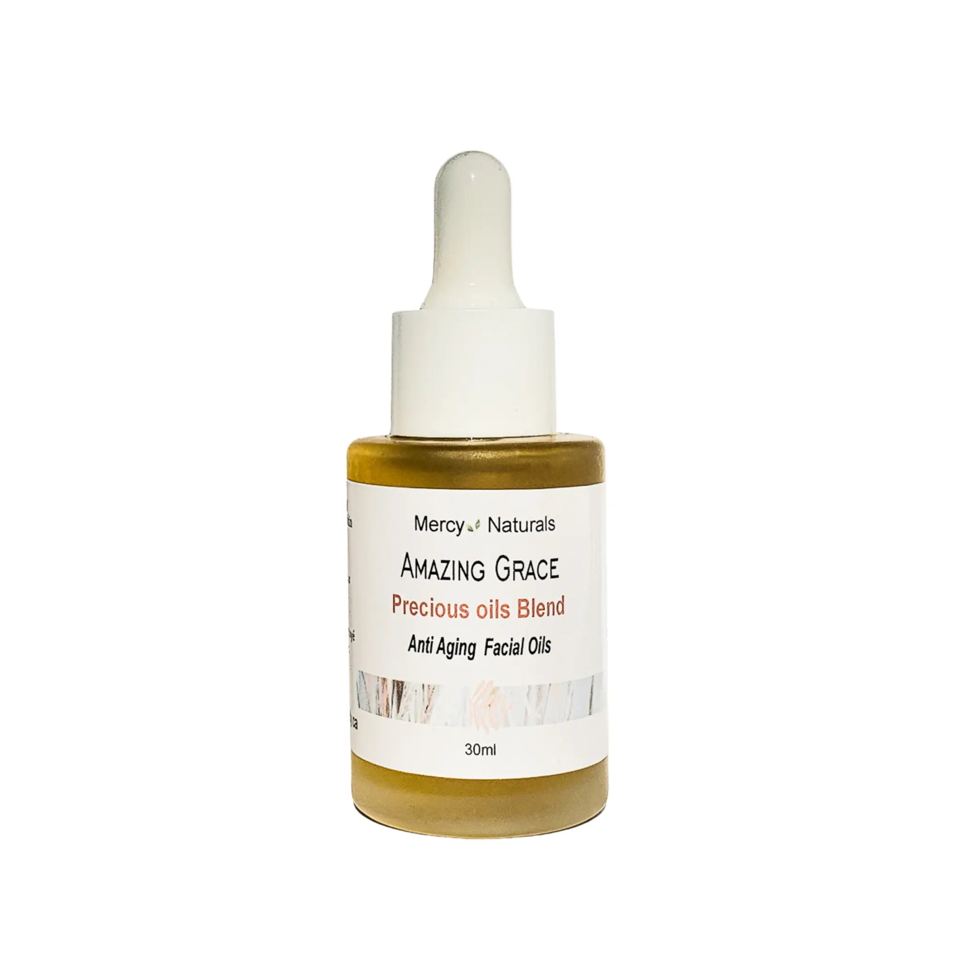 Bottle of 'Amazing Grace' precious oils blend with a white label on a white background