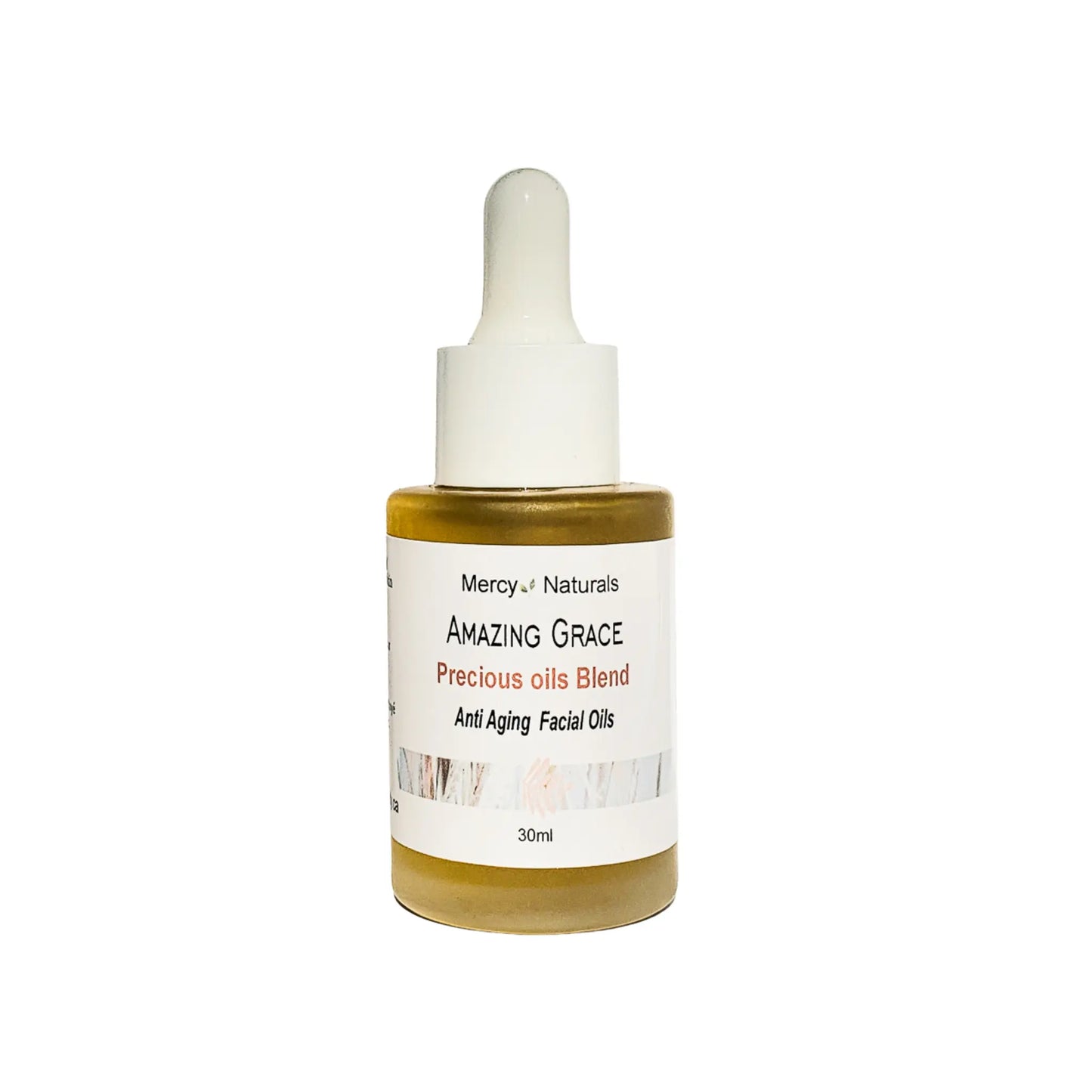Bottle of 'Amazing Grace' precious oils blend with a white label on a white background