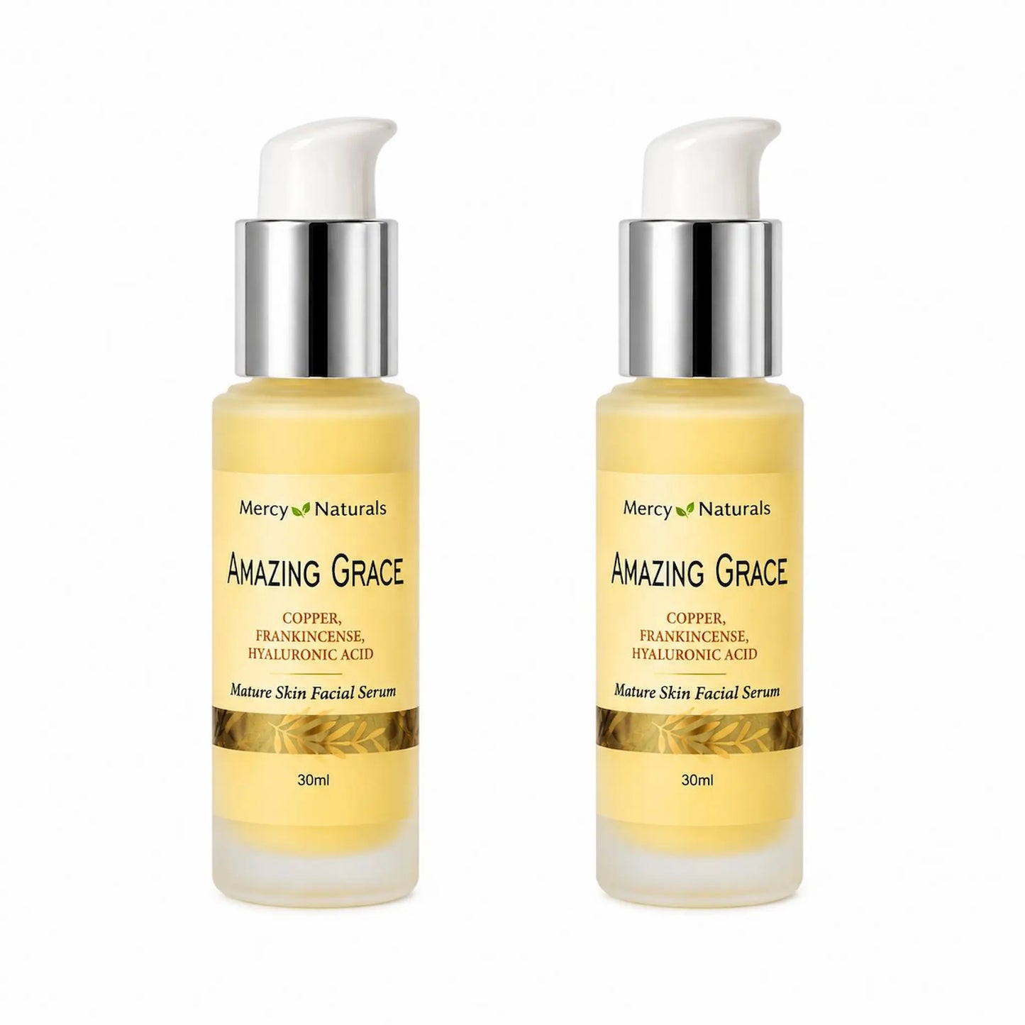 Two bottles of Mercy Naturals Amazing Grace serum on a white background