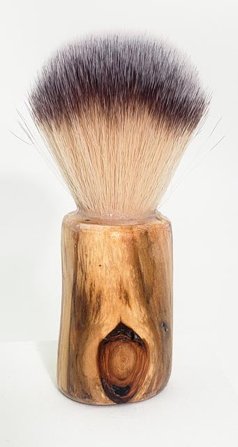 Shaving bruch with synthetic bristles, light natural wood  finsh handle.