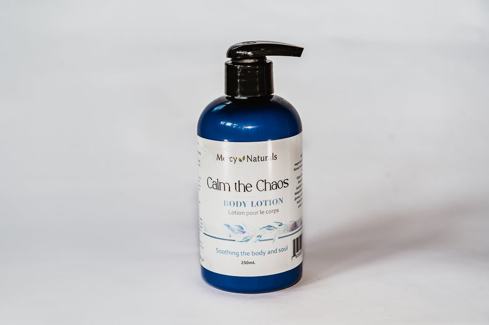 Body lotion bottle labeled 'Calm the Chaos' on a white background