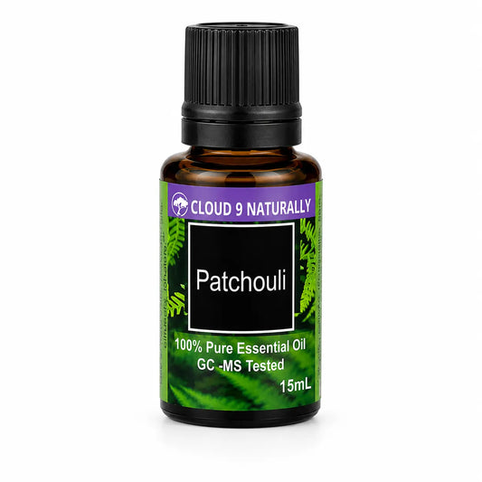 patchouli essential oil on white background