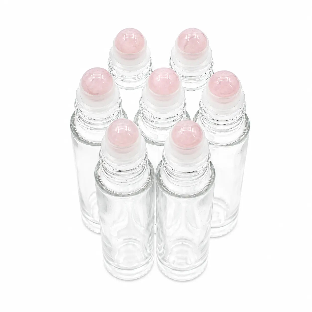 Six clear glass roller bottles with pink quartz gemstone roller balls, arranged in two rows on a white background.