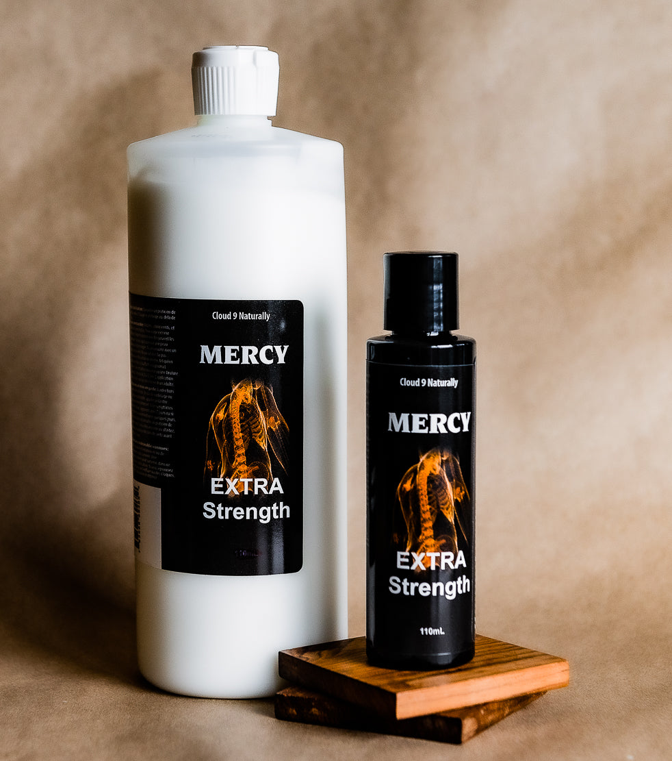 Mercy Extra strength  1 litre  White plastic bottle with flip top,  label has a picture of an orange colored spine skelaton with white lettering. Also a 110ml Mercy Extra strength black plastic bottle with flip top,  label has a picture of an orange colored spine skelaton with white lettering.